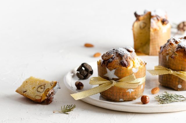 Mini,Panettone,In,A,White,Plate,On,A,White,Background.