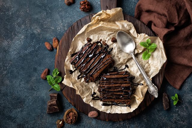 Chocolate,Brownie,Cake,,Dessert,With,Nuts,On,Dark,Background,,Directly